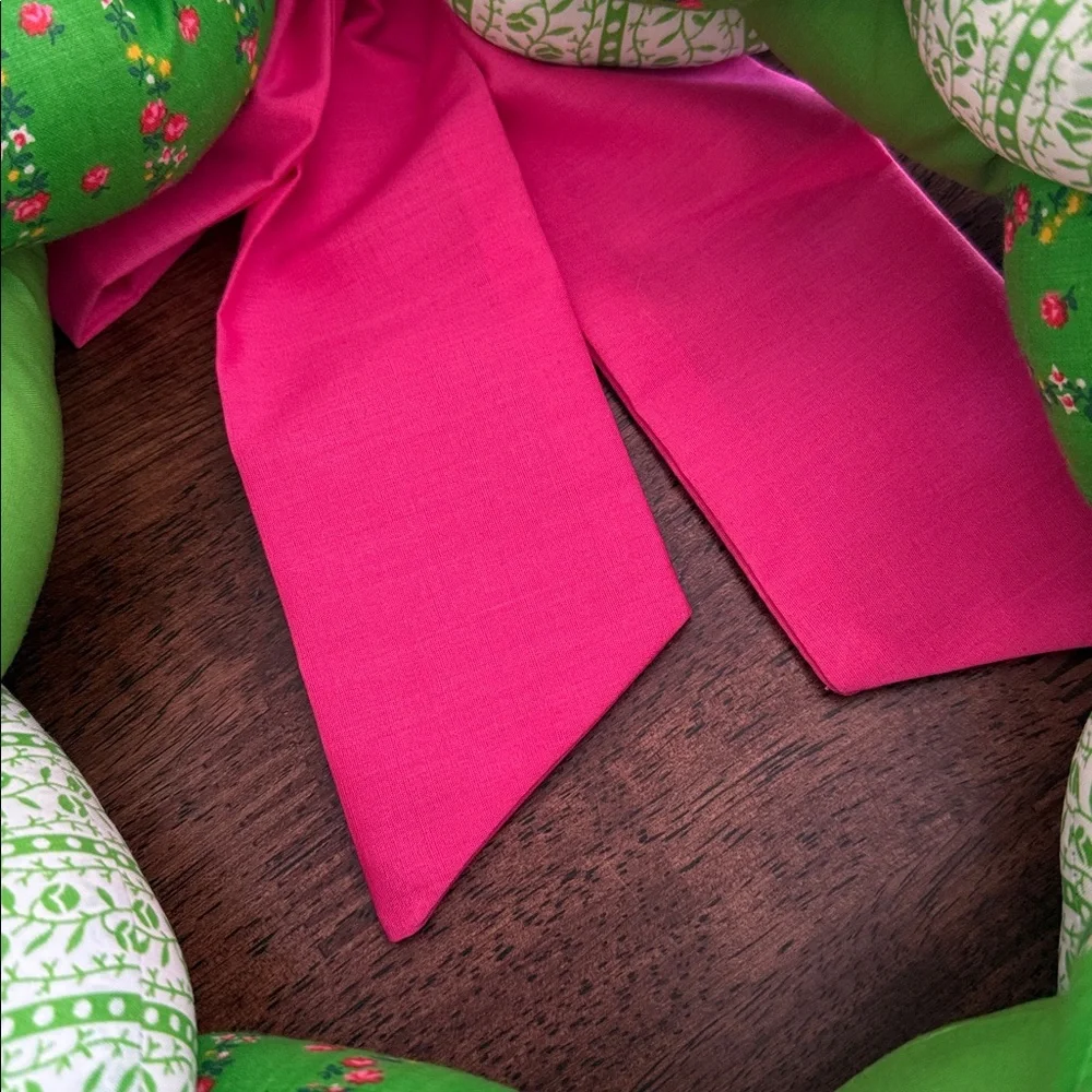 Vintage braided fabric plush wreath with pink ribbon